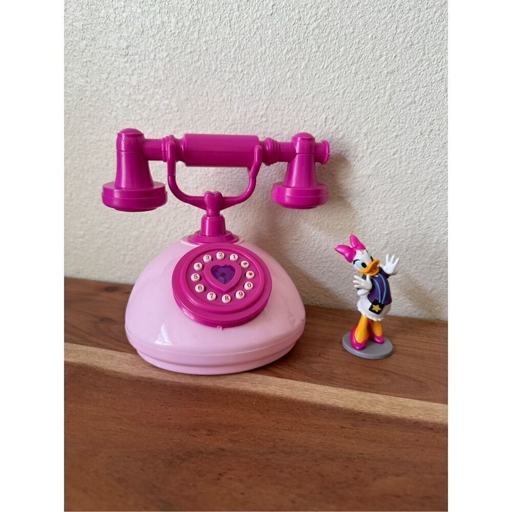 Daisy Duck as fan pvc figurine cake topper Minnie Mouse boutique telephone